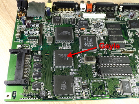 Left part of Amiga 1200 mainboard. Gayle chip marked with an arrow.