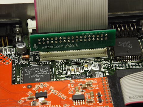 Keyboard connector of Amiga 1200 with KA59 plug inserted.